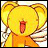 Pixelated yellow cartoon character with large rounded ears, red mouth, and orange clothing against a light background.