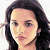 A 50x50 pixel animated buddy icon featuring a split composition with a person's face on the left and green text on a dark background on the right, displayed as two sampled frames in a contact sheet layout.