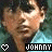 Pixelated image of a person with dark hair and light skin wearing a blue shirt, showing two side-by-side views with text below.