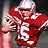 Pixelated static image of a football player in red uniform with white helmet and number 12, cropped to show upper body against dark background.