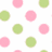 A static pattern of pink and green circular shapes on a white background with soft pixelated edges.