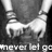 A grayscale pixelated image shows a white horse-like figure with flowing mane and tail against dark background, below which is partially visible text reading 'never let go'.
