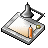 Pixelated icon of a desk lamp with conical shade, metallic base, and visible bulb socket on gray background.