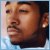 A 50x50 pixel animated buddy icon featuring a side-profile portrait of a person with dark hair and light skin, wearing a light blue shirt and small earrings, displayed in two frames on a gray background.