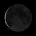 A sequence of 20 grayscale moon phases arranged in a , showing waxing and waning cycles from new to full and back to new