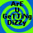 Four identical square arranged in a , each displaying a blue and green spiral background with black text reading "ArE U GeTTiNg DiZZy" in a pixelated font
