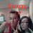 Two people in a close-up pose with red text reading 'Sexoy' above them on a pixelated background.