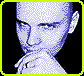 A pixelated avatar with a hand near its mouth, surrounded by a bright yellow border, with the word 'pumpkins' in green text below it.