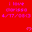 Red background with repeated pink text 'i love clarissa 4/17/08<3' and small heart symbols, partially cropped at bottom right.