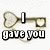 A key-shaped icon with a heart on one end and a looped ring on the other, displaying sequential text phrases across six