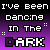 Pixelated text repeats 'I've been dancing in the dark' across a purple gradient background with black borders, showing animation changes between frames.