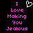 Black background with pink pixelated text reading "I Love Making You Jealous" and a white heart outline above the word "Love", displayed in two identical side-by-side