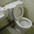 A 50x50 pixel animated buddy icon featuring a toilet on the left and green text "Original Icons .com" on the right, displayed as a contact sheet with two frames.