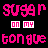 Pixelated pink text on black background reads 'sugar on my tongue' with two variations of the phrase displayed side-by-side and stacked vertically.