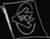A black-and-white animated icon shows a stylized head silhouette with internal line art that shifts across frames, maintaining consistent border shape.