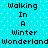 Pixelated text on cyan background with white dots, displaying "Walking In A Winter Wonderland" in two identical vertical