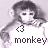 Pixelated grayscale image of a monkey-like figure with dark hair, holding an object near its face, below which is the text 'monkey' and a heart symbol.