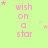 Light green background with pink text reading 'wish on a star' and scattered pink and light pink stars in various sizes.