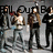 Four figures in formal attire stand beneath large text reading 'Fall Out Boy' against a gray background.