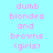 Pixelated text displays 'dumb blondes and browns (girls)' in pink on a light blue background with maroon accents.