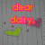 Pixelated text and shapes on a gray background with red, green, and pink elements shifting across frames.
