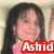 Pixelated portrait of a person with long dark hair wearing pink clothing, overlaid with red banner containing white text.