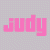 Two side-by-side display the word "judy" in pixelated text; left has pink letters on light gray dotted background, right shows light gray letters on solid pink background