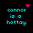 Pixelated cyan text reads 'connor is a hottay.' on black background with pink heart and dot cluster symbols.