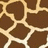 Brown and beige pixelated pattern with irregular shapes forming a giraffe-like spot design on a light background.