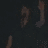 Dark background with multiple brown and gray pixelated shapes resembling hands or claws in various positions, some with red accents.