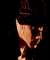 Four distinct pixelated portraits arranged in a , each with unique facial features and backgrounds