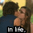 A pixelated image of two people kissing under a tree, with text overlays reading "In life. there are always gonn be weird couples".
