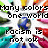 Pixelated image with bold black text reading "Many Colors One World Racism is not ok" over a multicolored pixel background featuring blue, green, red, yellow, and orange hues.