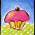 Pixelated cartoon cupcake with pink frosting and dark topping on green grass under blue sky, next to blue text reading "Cartoon Muffin!".