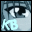 Pixelated image of stylized eyes with white highlights and black pupils, featuring a light blue 'KB' text element below.