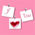 Three pinned white cards on a pink background, with a red heart symbol on the bottom card and partial text on the top two cards.