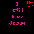 Pixelated text and a heart symbol on black background, with pink text reading "I still love Jesse" in two identical vertical