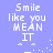 Pixelated text 'Smile like you MEAN IT' with a simple face icon on light purple background, animated to shift position and add small dots.