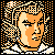 Pixelated static icon of a stylized human face with orange and beige tones, surrounded by black-and-white checkered patterns on the left and right edges.