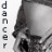 A grayscale pixelated image of a person's face with the word 'dancer' vertically aligned on the left side.