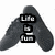Two side-by-side pixelated A-shaped icons with dark gray bodies and black text boxes containing white text; left icon reads "LIFE IS FUN" vertically, right icon reads "DAMNED" and "serious" horizontally.