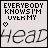 four and four shows repeated text "EVERYBODY KNOWS I'M OVER MY" above a blurred word "head", with small symbols changing in each