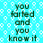 A static image with a light blue background patterned by white hexagons, displaying repeated text in dark green pixelated font.