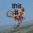 A pixelated animation of a person riding a motorcycle performing a wheelie against a blue sky and green hill background, with text changing across frames.