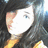 A person with long dark hair and a yellow top appears in two ; the right displays pink text while the left shows different pink text