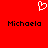Red background with white pixelated heart symbol above two black pixelated text instances of 'Michaela' side by side.