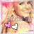 A pixelated image of a person with light brown hair wearing a yellow top and dark bow tie, featuring two heart symbols in the lower-left corner.
