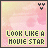 Pixelated icon with pink and yellow gradient background, black text reading LOOK LIKE A MOVIE STAR, and three small Y-shaped symbols at top center.