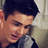 A pixelated image of a person with dark hair wearing a dark shirt, with red text reading "ZAC (3333)" in the upper right corner.