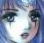 Pixelated close-up of a face with blue-toned background, showing eyes, nose, and mouth in low-resolution digital style.